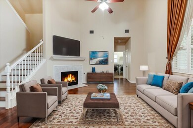 Living room featuring separate washer and dryer, a