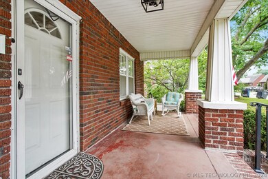 Full length porch offers evening shade.