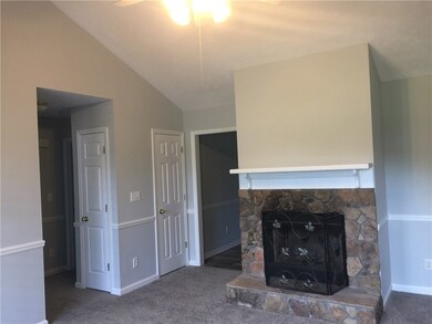 Living Room with fireplace and plenty of closet space