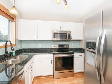 Gorgeous tiled backsplash, Granite countertops, an