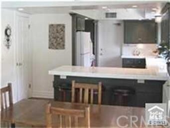 Family room overlooks kitchen & view to rear yard.