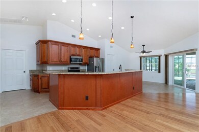 Beautiful raised-panel wood cabinets in an elegant