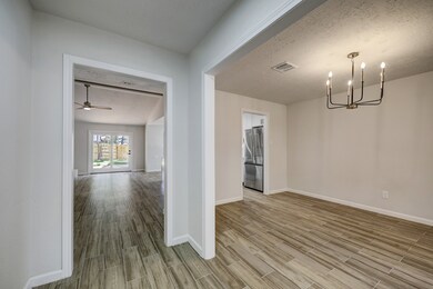 View from the entry towards the Den, Formal Dining