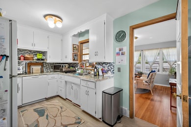 Kitchen - sunroom through doorway on right.