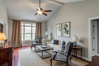 The Living Room has cathedral ceilings, wood floor