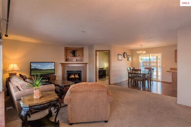 Living room with Gas fireplace, open plan to kitch
