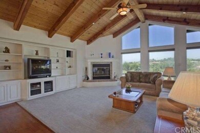 Family Room with fireplace and built in bookshelf