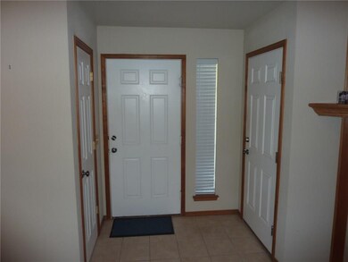 Entry door - Coat Closet on left side and garage e