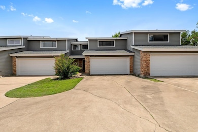 View of front of property with brick siding, an a