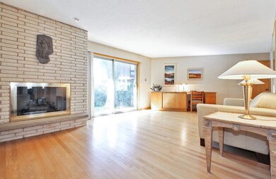 Large, yet cozy family room with hardwood floors, 