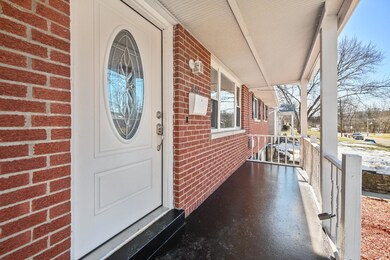 Relax on this great front porch... even the mailbo