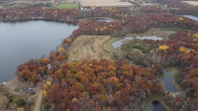You'd share this woods at the bottom of the photo with one other neighbor to the north