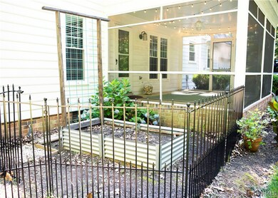 Rear side fenced garden with gate