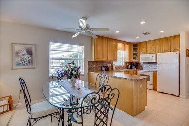 Kitchen and dining room areas.