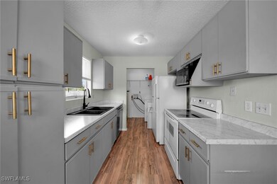 Kitchen with a NEW sink, New Laminate countertops,
