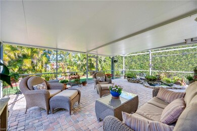 Brick paved covered outdoor screen lanai