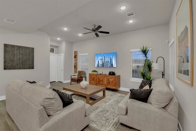 Spacious Living Room for family time and guests!