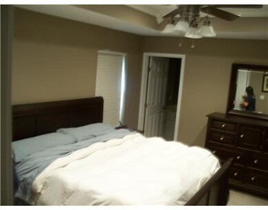Master Bedroom. Master has tray ceiling with his a