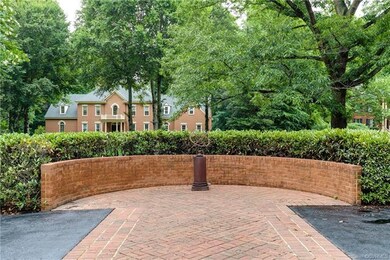 Brick courtyard off of the circular driveway