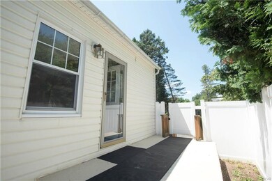Back door opens into kitchen.