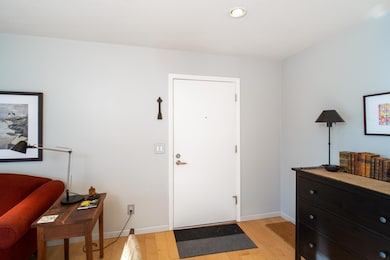 Front door entrance into living room
