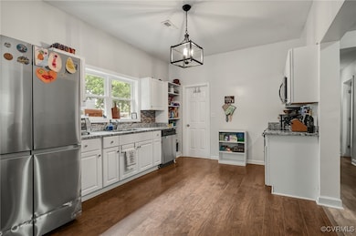 Kitchen featuring appliances with stainless steel