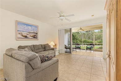 Spacious living room facing the sliding glass doors with spectacular view of the preserve and walking trail.