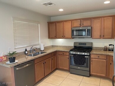 Kitchen that features stainless steel appliances,