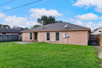 This is a single-story brick home featuring a siza