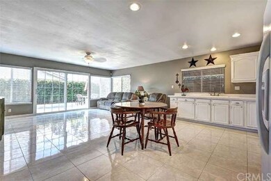 Open Kitchen to Family Room with View of Backyard