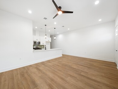 Alternate view of the living and dining area, feat
