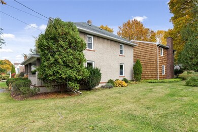 The original home features stucco siding and the a
