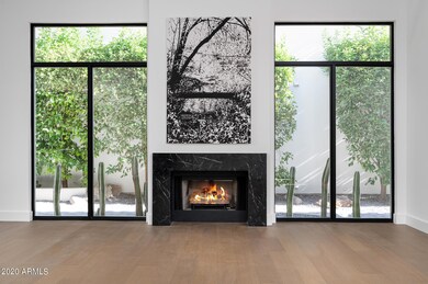 Custom black marble fireplace