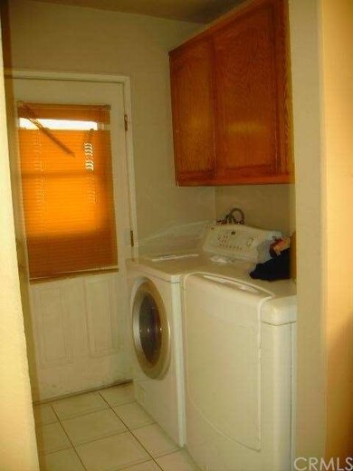 INDOOR LAUNDRY NEXT TO KITCHEN