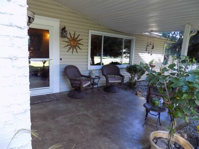 Covered Front Porch With Stamped Concrete