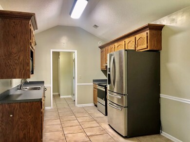 Second Kitchen View w/ Stainless Appliances