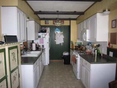 Kitchen as seen from the table provides ample spac