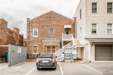 Access the unit through door at top of stairs.
