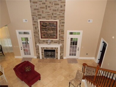 Rough stone tile work provides a nice backdrop to