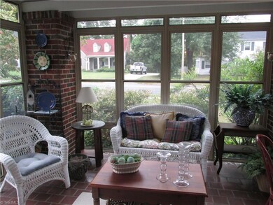 Sunroom on front of property - charming.
