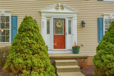Greet guests at the spacious entry featuring a bev