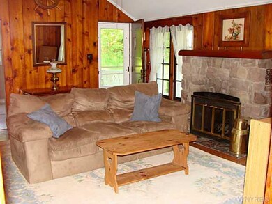Family Room Large family room with stone fireplace