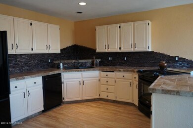 Kitchen With Glass Tile Backsplash