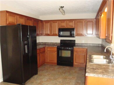The Kitchen comes complete with Stove, Refrigerator, Dishwasher and Microwave.