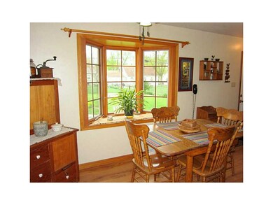 Dining Area. Newer laminate flooring, bay window w