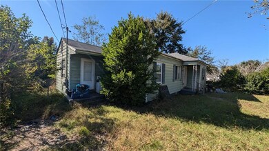 View of front of house with a front lawn