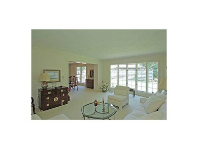 Living Room-L1. Wool carpeting through formal livi