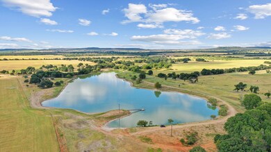 Bird's eye view featuring a rural view and a water