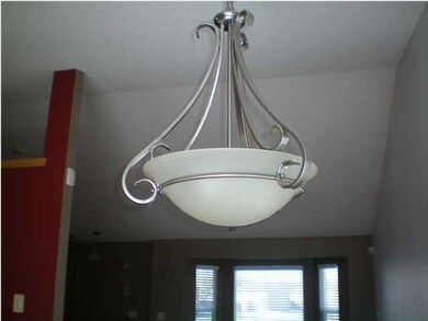 Updated lighting throughout the kitchen/dining are