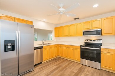 Kitchen featuring appliances with stainless steel